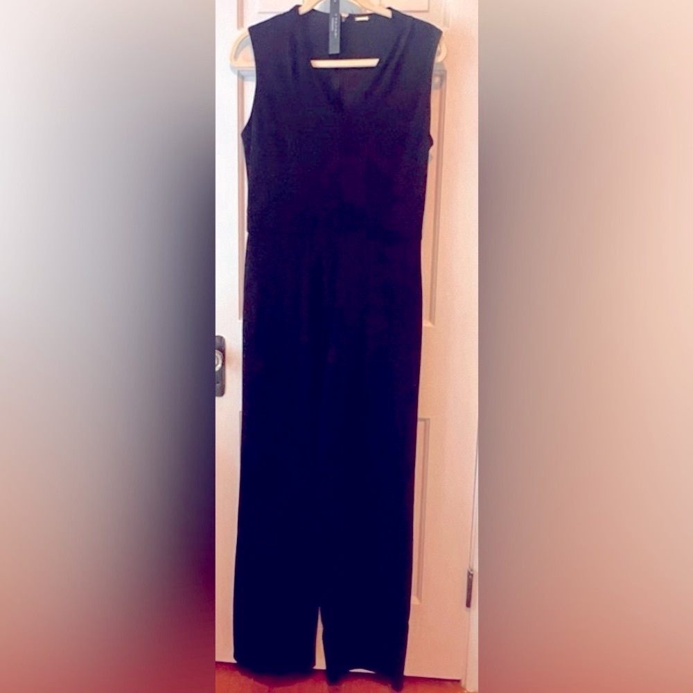 Beautiful jumpsuit by Tahari V-neck black jumpsuit.  Size 8 NWT